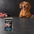 Puszka karmy mokrej John Dog Jagnięcina Pure Black 400 g obok psa