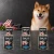 Zestaw 6 puszek karmy mokrej John Dog Jagnięcina Pure Black po 400 g obok psa