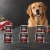Zestaw 6 puszek karmy mokrej John Dog Wołowina Pure Black po 800 g obok psa