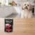 Puszka karmy mokrej John Dog Wołowina Pure Black 400 g obok psa w domu