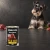 Puszka karmy mokrej John Dog Dzik Pure Black 400 g obok psa