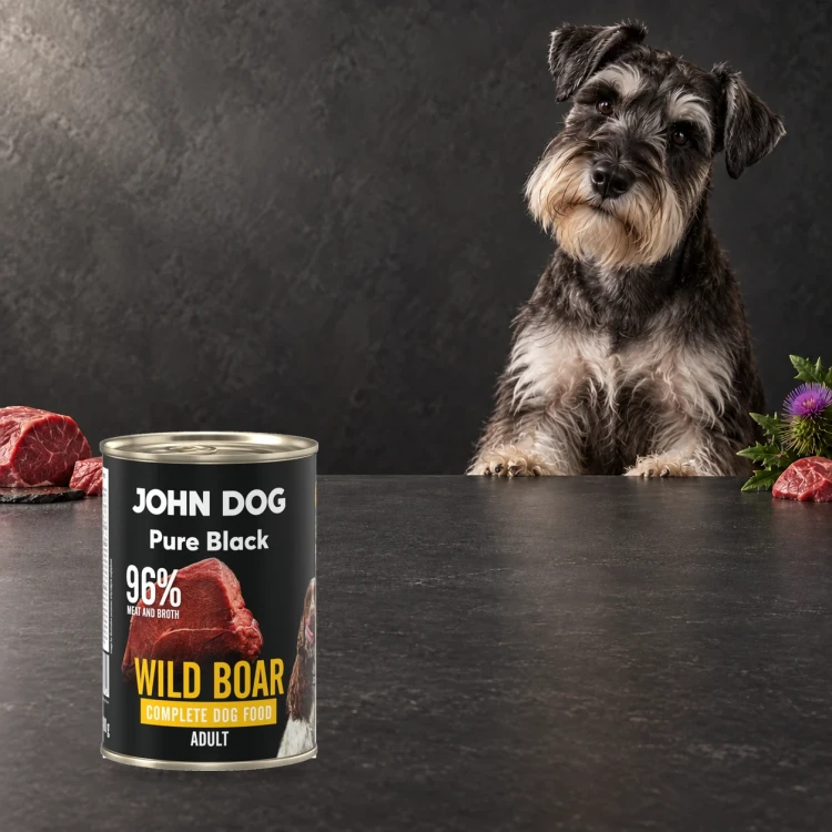 Puszka karmy mokrej John Dog Dzik Pure Black 400 g obok psa