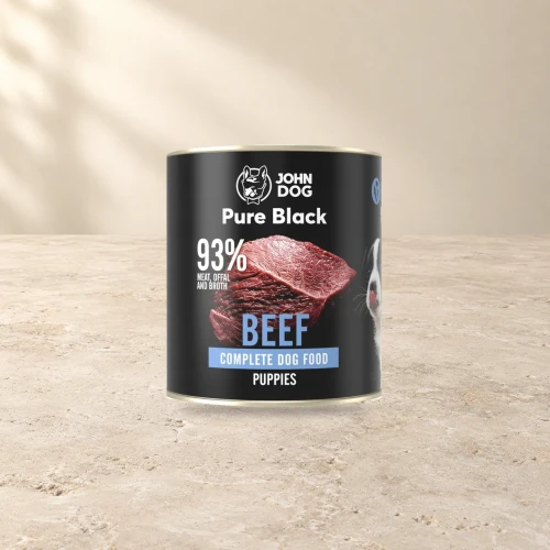 Puszka karmy mokrej John Dog Wołowina Pure Black Junior 800 g na jasnym tle