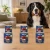 Zestaw 6 puszek karmy mokrej John Dog Dziczyzna z malinami Berry Line po 800 g obok psa w domu