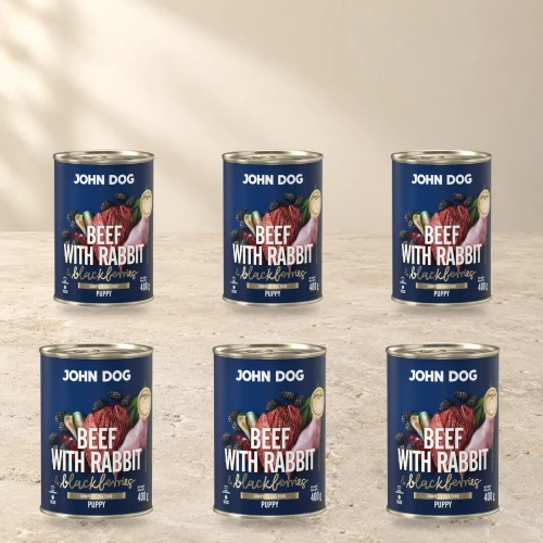 Zestaw 6 puszek karmy mokrej John Dog Wołowina z królikiem i jeżynami Junior Berry Line po 400 g na jasnym tle
