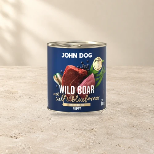 Puszka karmy mokrej John Dog Dzik z cielęciną i jagodami Junior Berry Line 800 g na jasnym tle