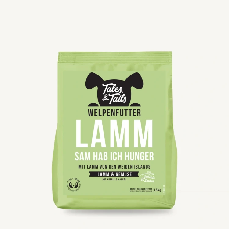 Karma półwilgotna Tales & Tails 1,5 kg z jagnięciną dla szczeniąt na jasnym tle.