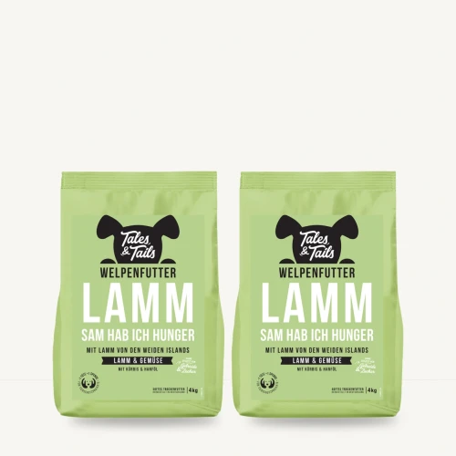 Zestaw Tales & Tails 2 × 4 kg z jagnięciną dla szczeniąt na jasnym tle.