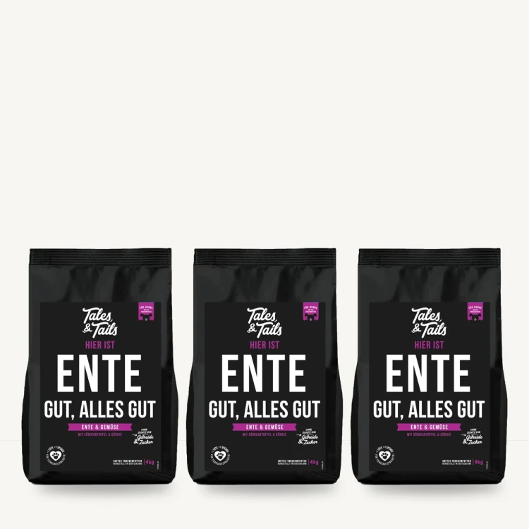 Zestaw Tales & Tails 3 × 4 kg z kaczką dla dorosłych psów na jasnym tle.