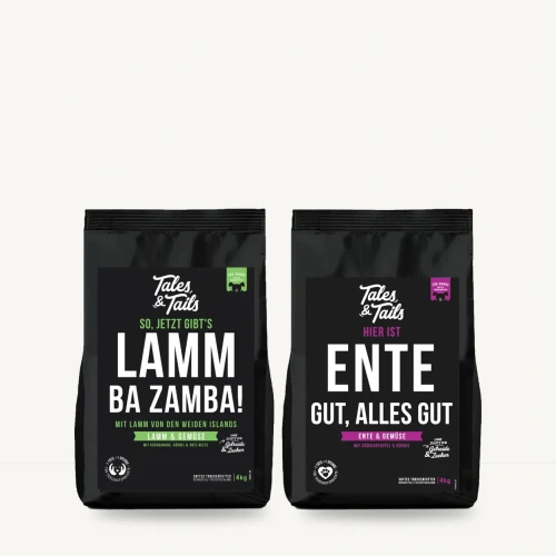 Zestaw karm półwilgotnych Tales & Tails 2 × 4 kg, jagnięcina, kaczka na jasnym tle.