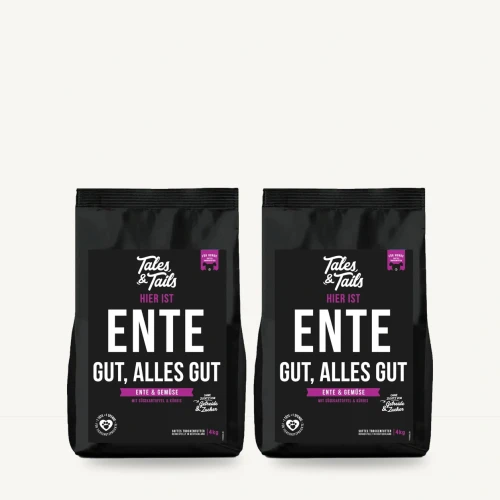 Zestaw Tales & Tails 2 × 4 kg z kaczką dla dorosłych psów na jasnym tle.