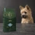 Worek karmy EMPIRE Prime Puppy dla szczeniąt małych i średnich ras 12 kg obok szczeniaka cairn terriera na ciemnym tle
