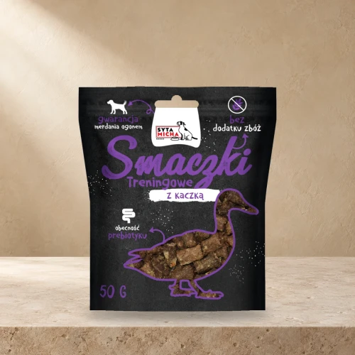 Smaczki treningowe Syta Micha z kaczką 50 g na jasnym tle.